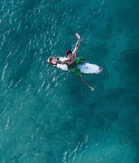Gabriel Medina on his board
