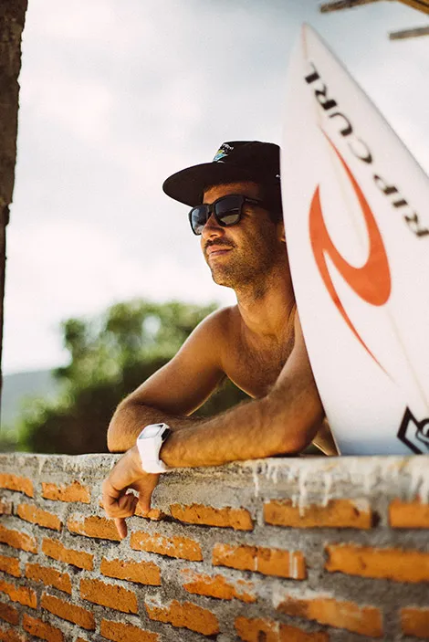 Mason Ho with his Rip Curl surfboard