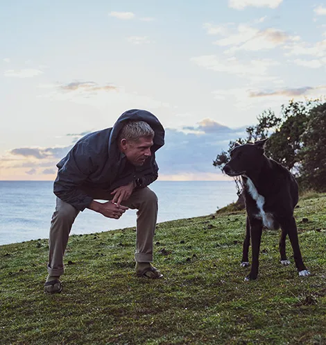 Mick Fanning with a dog