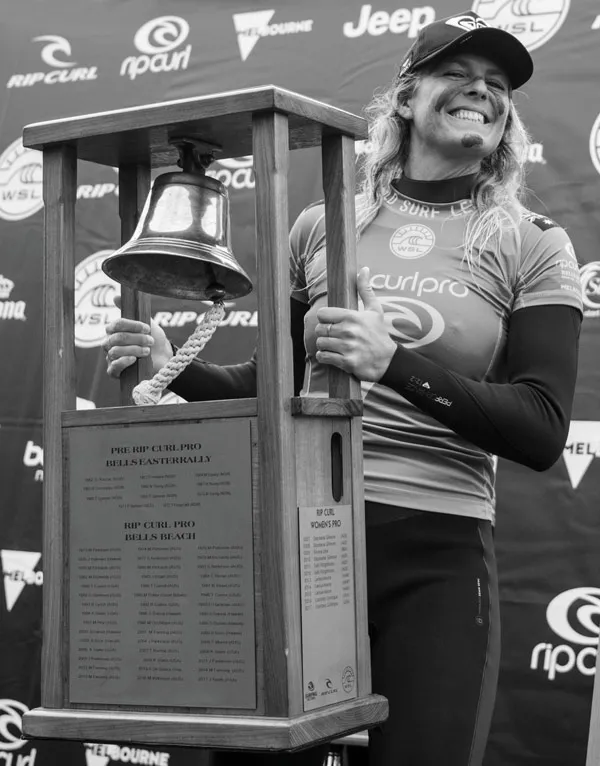 Stephanie Gilmore holding the Rip Curl Pro Bells Beach trophy