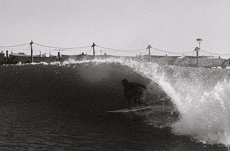 Tom Curren getting barrelled by a wave
