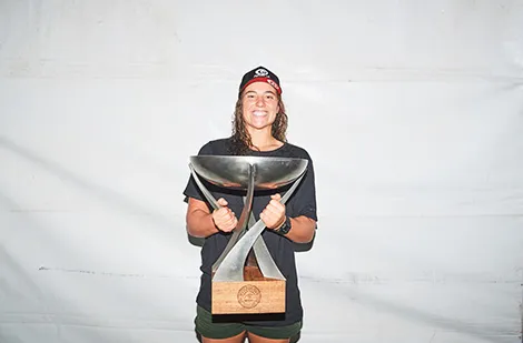 Tyler Wright holding her trophy